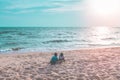 Two siblings children playing with wave and sand in Pattaya Beach Thailand Royalty Free Stock Photo