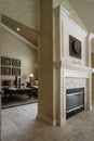 Two sided fireplace and living room Royalty Free Stock Photo