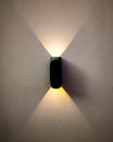 two sided wall light with yellow light