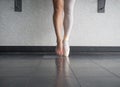 Two sides to a ballerina`s feet, both in and out of her dancing ballet shoes Royalty Free Stock Photo