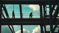 Two Silhouettes of Construction Workers on a Steel Beam Royalty Free Stock Photo
