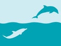 Two silhouettes of dolphins playing in water
