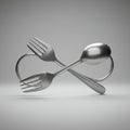 Two silver forks and a spoon are creatively intertwined and balanced, forming a Royalty Free Stock Photo