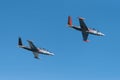Two silver Fouga Magister jets flying at the Kaivopuisto Air Show