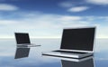 Two silver Laptops scene