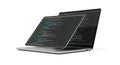 Two silver laptops side by side on white background with programming code displayed on left screen in blue and green text Royalty Free Stock Photo