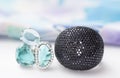 two silver rings with black cubic zirconias and semiprecious stones