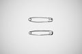 Two silver safety pins on white background Royalty Free Stock Photo