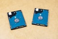 Two simple identical HDD hard drives, objects closeup, nobody. Digital data storage, media backup, copying files, storing