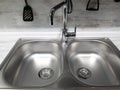 Two sinks and a faucet in the kitchen Royalty Free Stock Photo