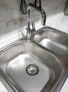 Two sinks and a faucet in the kitchen Royalty Free Stock Photo
