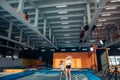 Mother and daughter jumping on trampoline and doing split Royalty Free Stock Photo