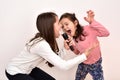 Two sisters with a microphone fooling around and singing Royalty Free Stock Photo