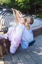 Two sisters on the railing