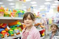 Two sisters in toy store Royalty Free Stock Photo