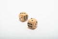 Two six sided dice showing three and two