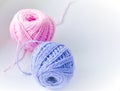 two skeins of multicolored wool yarn on an  white background. Close-up Royalty Free Stock Photo