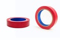 Two skeins of red electrical tape on a white background Royalty Free Stock Photo