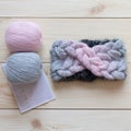 Two skeins of wool and knitted headband Royalty Free Stock Photo