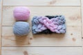 Two skeins of wool and knitted headband gradient Royalty Free Stock Photo