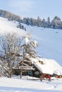 Two Skiers Finish a Day of Skiing