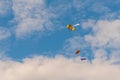 Two skydivers flying with parachute against blue sky - extreme sport concept Royalty Free Stock Photo