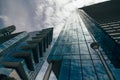 Two skyscraper view from below against the sun