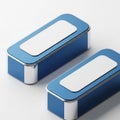 Two Sleek Blue and Silver Rectangular Boxes with White Rectangular Lids on a White Background Royalty Free Stock Photo
