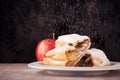 Two slices of apple strudel with spilled powder sugar Royalty Free Stock Photo