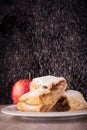 Two slices of apple strudel with spilled sugar Royalty Free Stock Photo