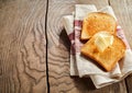 Two slices of golden crispy white bread toast