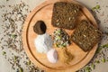 Two slices of sourdough rye bread on a wooden board with ingredients Royalty Free Stock Photo