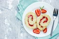 Two slices of strawberry biscuit roll cake Royalty Free Stock Photo