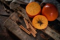 Two slised ripe Persimmon fruit with cinnamon Royalty Free Stock Photo