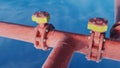 Two Sluice gates and Two connectors on Large Red Frosted Pipes