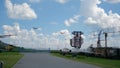 Two small airplanes flying over military open-air museum