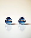 Floating Blue Tear Drops Symbolize Joy and Connection in a Whimsical, Artistic Display Royalty Free Stock Photo