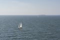 Two small boats sailing in middle of finland gulf in sunny blue day Royalty Free Stock Photo