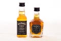 Two small bottles of Tennessee whiskey on a white background