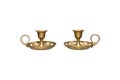 Two small candlesticks with a handle and cut-out hearts at the base, isolated on a white background with a clipping path. Royalty Free Stock Photo