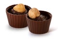 Two small chocolate baskets with cream and nut Royalty Free Stock Photo