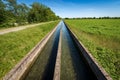 Two Small Concrete Irrigation Canals in the Countryside - Padan Plain Italy