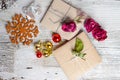 Two small gifts wrapped in ecologic paper, old wooden white table Royalty Free Stock Photo