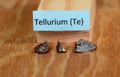 Two small pieces of the periodic element no 52 Tellurium
