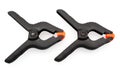 Two small plastic clamps Royalty Free Stock Photo