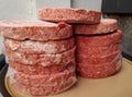 Stacks of Raw Hamburgers Royalty Free Stock Photo