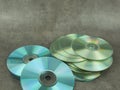 Two small stacks of recordable CDs