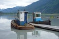 Two small tugs used for pushing rafted logs.