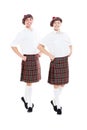 Two smiley dancers in scotch national clothes Royalty Free Stock Photo