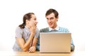 Two smiley students with laptop